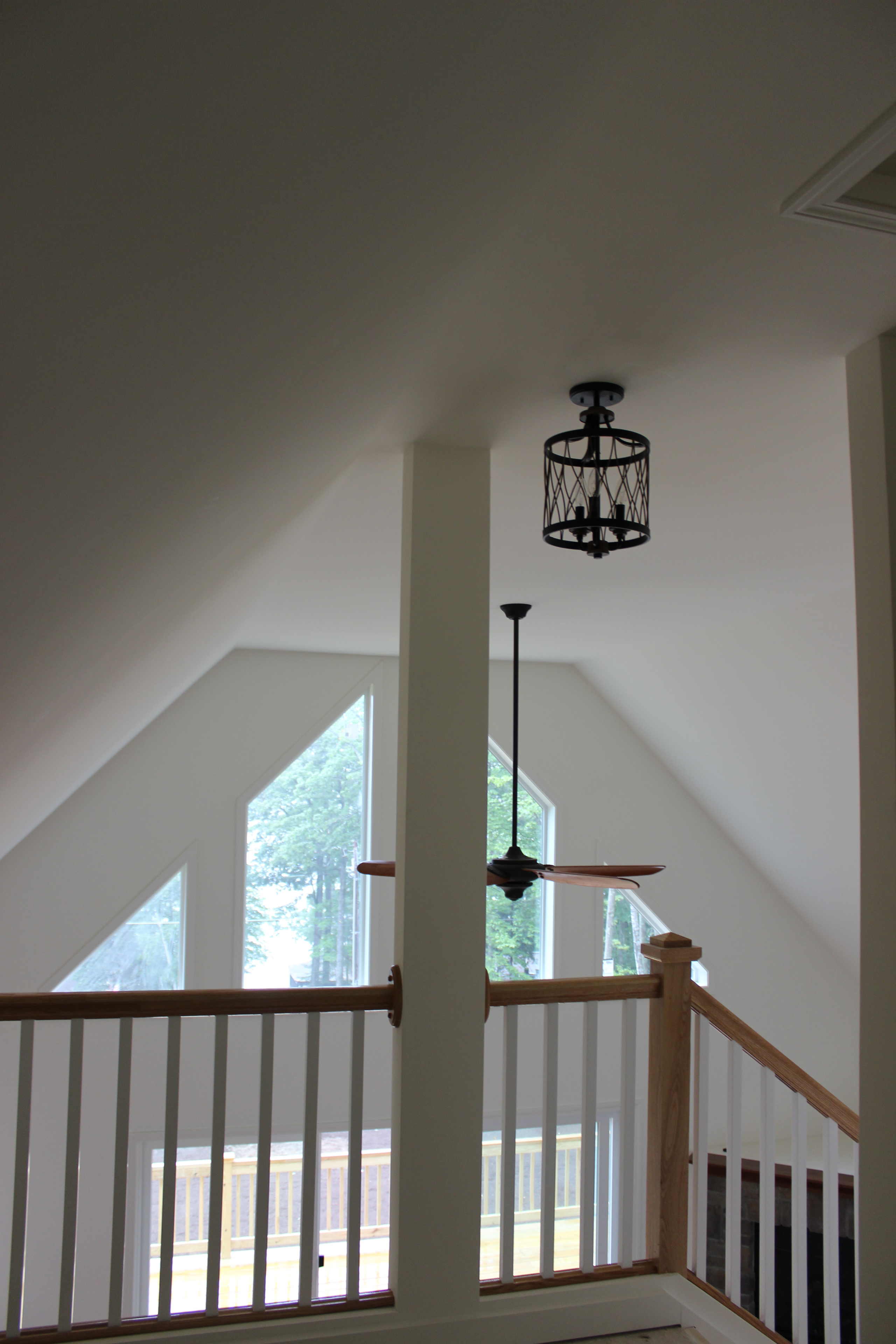 Berzinis looking down from loft