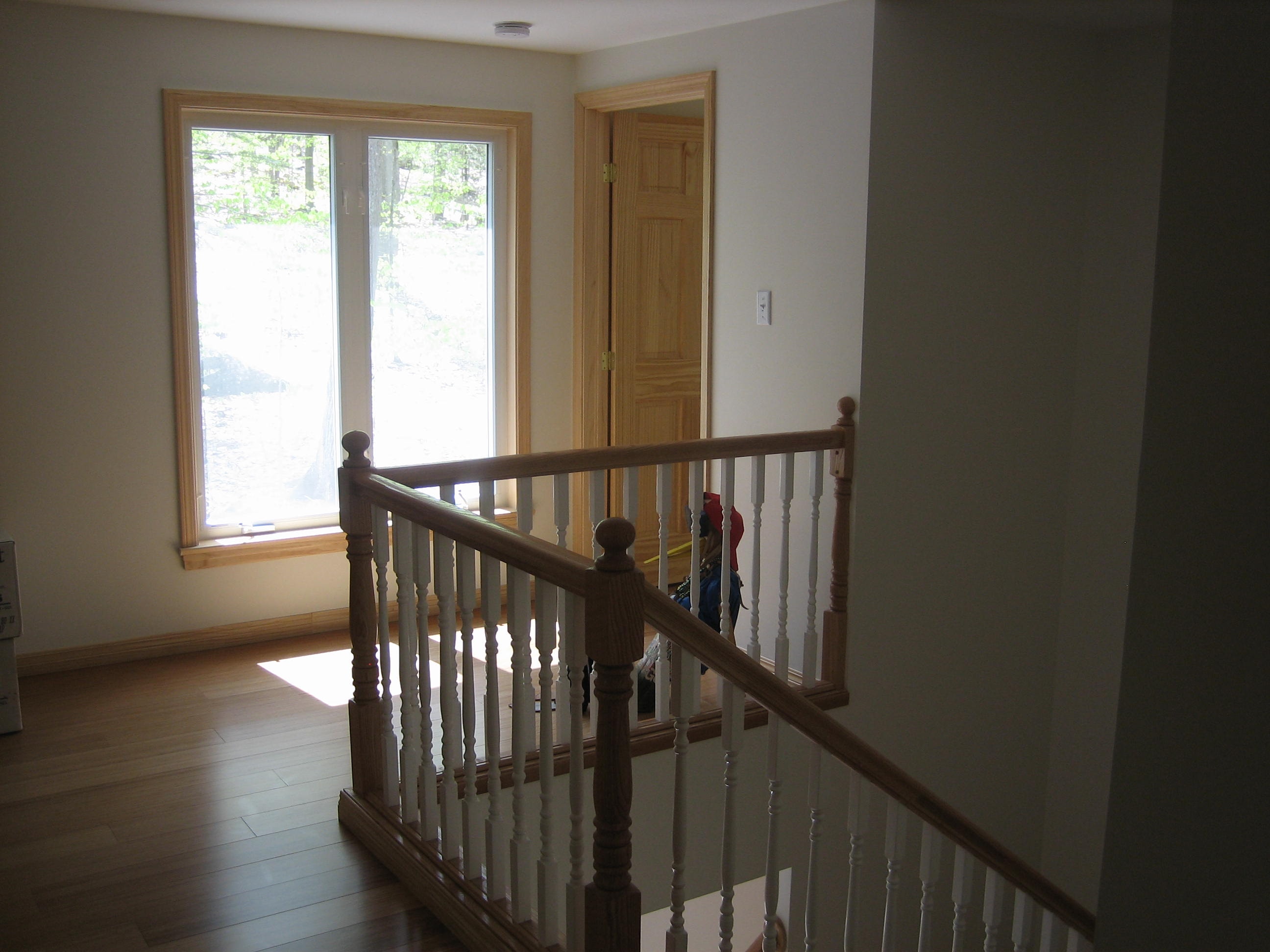 Lloyd second floor landing with wood railings