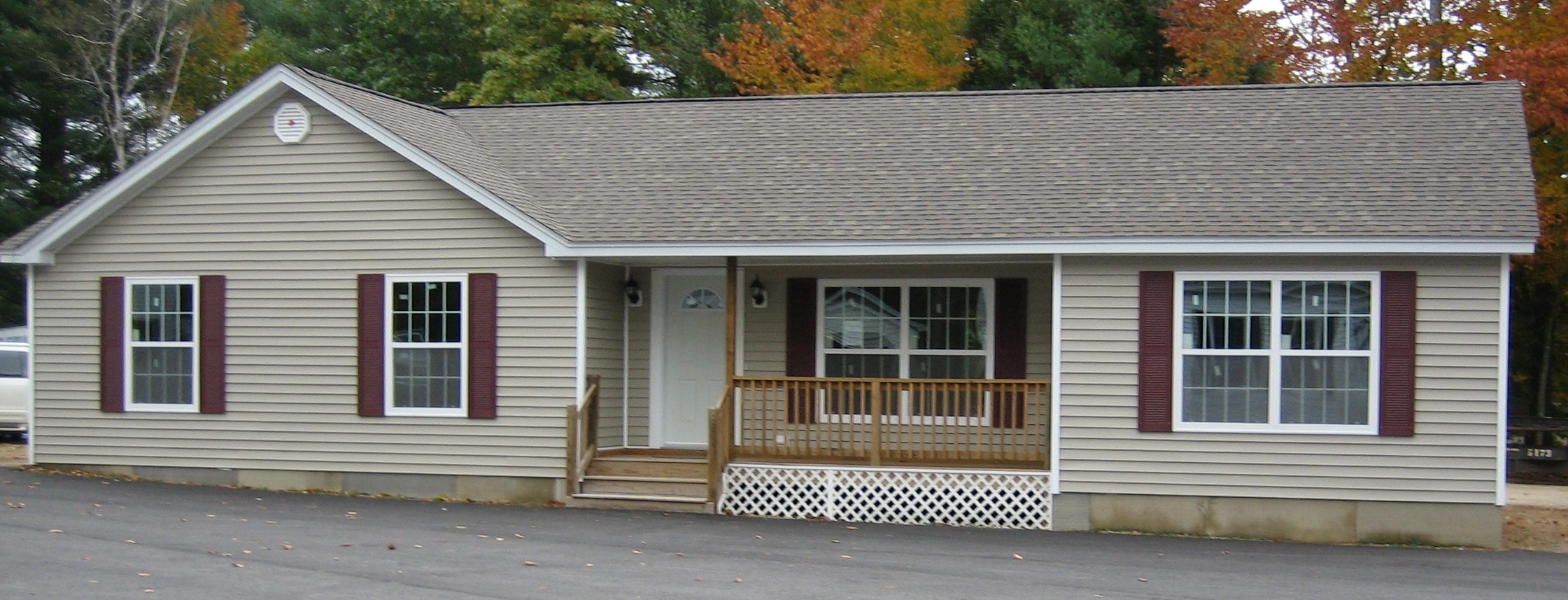 Ranch model exterior with burgundy shutters