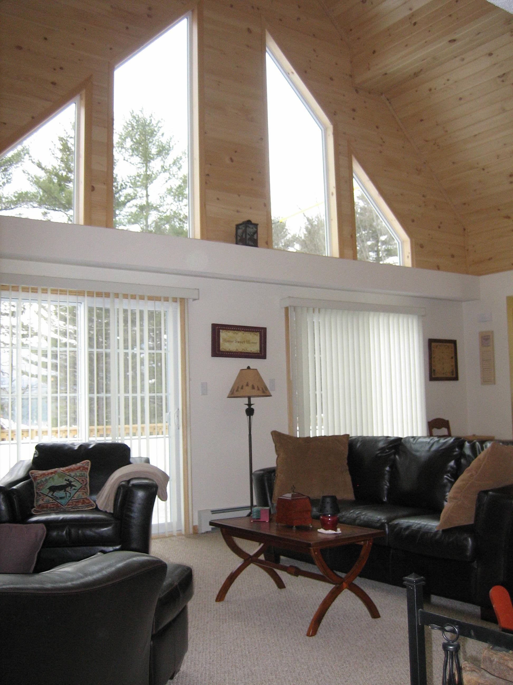 Thompson home interior with vaulted wood ceiling
